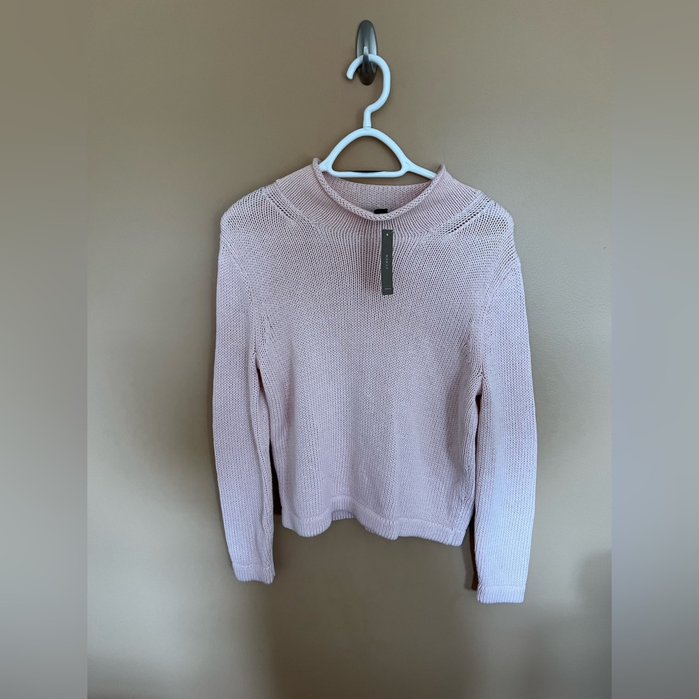 Size xs light pink J.Crew sweater. Never been worn.